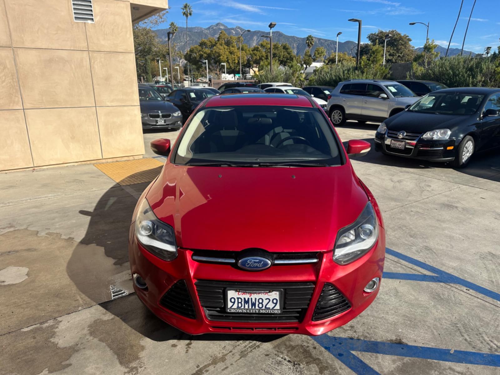 2012 RED /BLACK Ford Focus SE Sedan (1FAHP3F29CL) with an 2.0L L4 DOHC 16V engine, AUTOMATIC transmission, located at 30 S. Berkeley Avenue, Pasadena, CA, 91107, (626) 248-7567, 34.145447, -118.109398 - New Tires! Nice Interior! drives and looks good! Bad credit? We can help! We are the bank. All our cars are thoroughly inspected and reconditioned by our technicians. FREE CARFAX report. Stop by or call to speak with our friendly staff. Whether you have bad credit, no credit, bankruptcy, or reposse - Photo #7